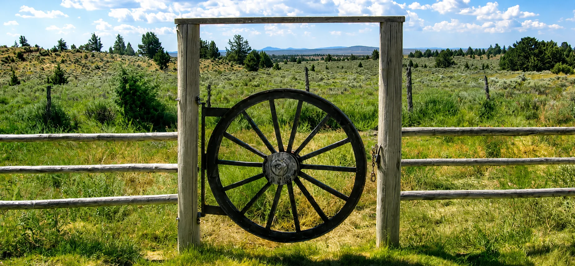 Scenic rural landscape with wheel gate